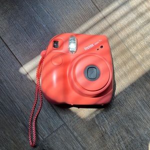 This is an Instax mini 7+ in the the color Coral.
